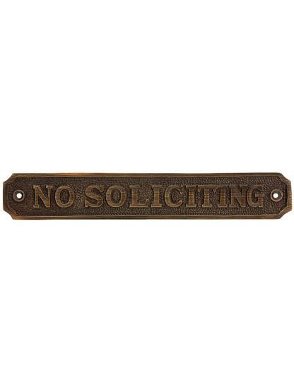 Cast Brass No Soliciting Sign in Antique Brass.